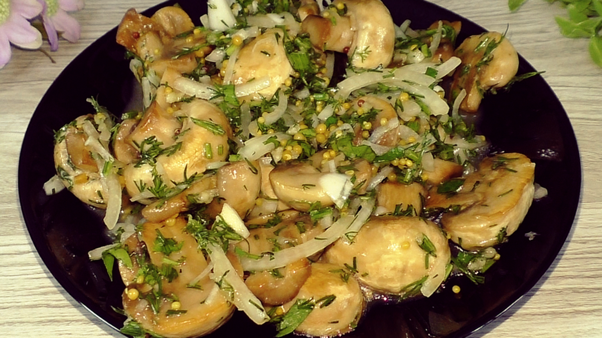Изумительно вкусные маринованные шампиньоны: идеальная закуска для праздников
